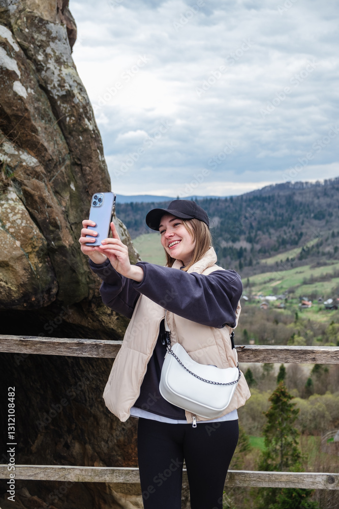 Woman Taking Selfie in Scenic Mountain Area