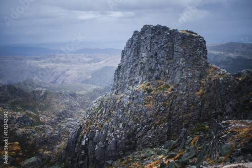 Obraz na płótnie Rugged rocks in the Serra da Estrela mountain range, Portugal, under overcast skies in autumn, creating a dramatic and moody atmosphere. w salonie