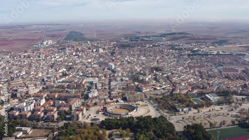 Panoramic aerial view of Alcazar de San Juan City. Located in the province of Ciudad Real, autonomous community of Castilla–La Mancha. Travel destination. Drone going forward.