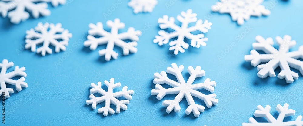 Beautiful snowflakes on a blue background creating a stunning falling snowflakes texture depicting winter aesthetics Beautiful snowflakes on a blue background creating a stunning falling snowflakes texture depicting winter aesthetics