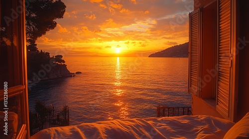 Fototapeta Naklejka Na Ścianę i Meble -  Stunning sunset view from bedroom window overlooking ocean.