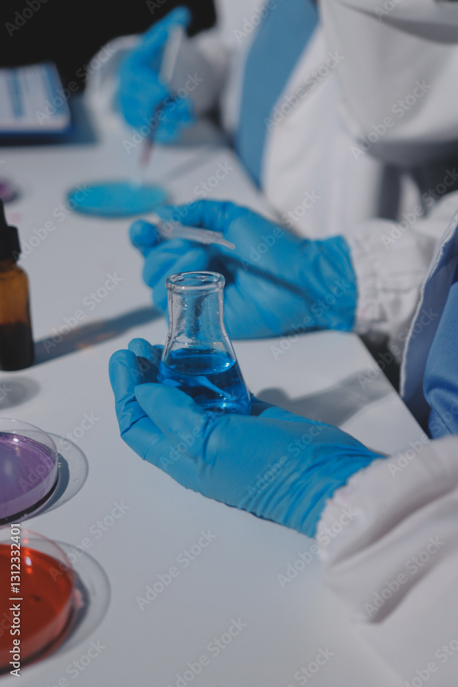 Researchers working in the clinical laboratory Researchers working in the clinical laboratory