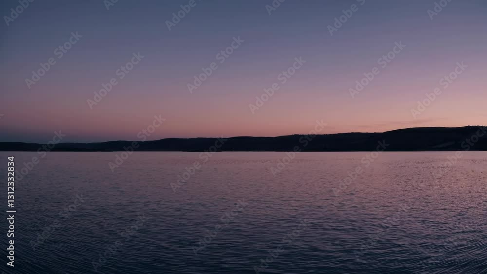 Calm lake surface mirroring vibrant purple sunset hues, reflecting peaceful evening light with soft gradients spreading across tranquil water landscape Calm lake surface mirroring vibrant purple sunset hues, reflecting peaceful evening light with soft gradients spreading across tranquil water landscape