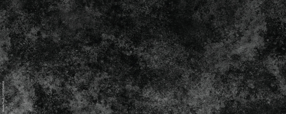 Fototapeta premium A Naturally Cracked and Eroded Dark Surface with Unique Abstract and Weathered Patterns