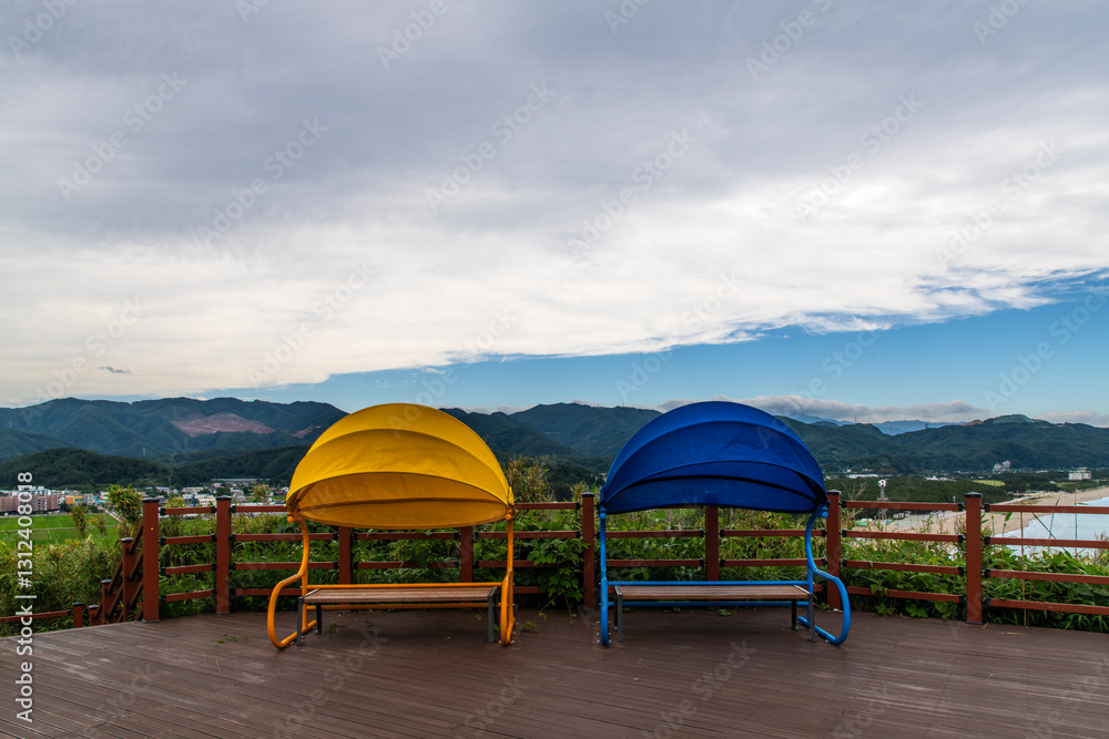colorful benches and wooden floor at the observatory