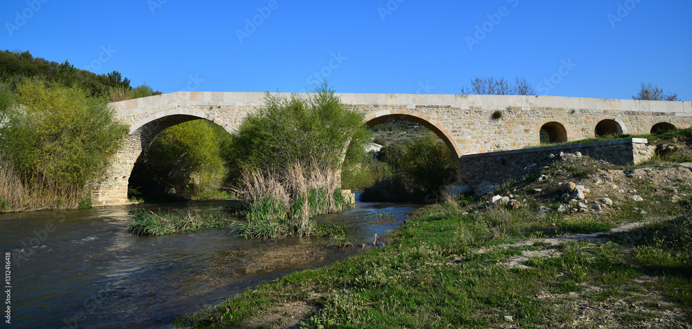 Fototapeta premium Located in Usak, Turkey, Beylerhan Bridge was built in the 14th century.