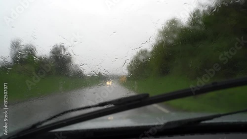 View from car window while driving in the rain