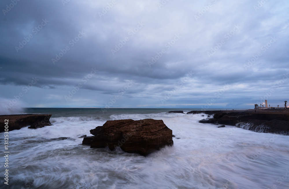 Obraz premium Storm on the ocean. Beautiful landscape of the seashore promenade at Rabat, Morocco.