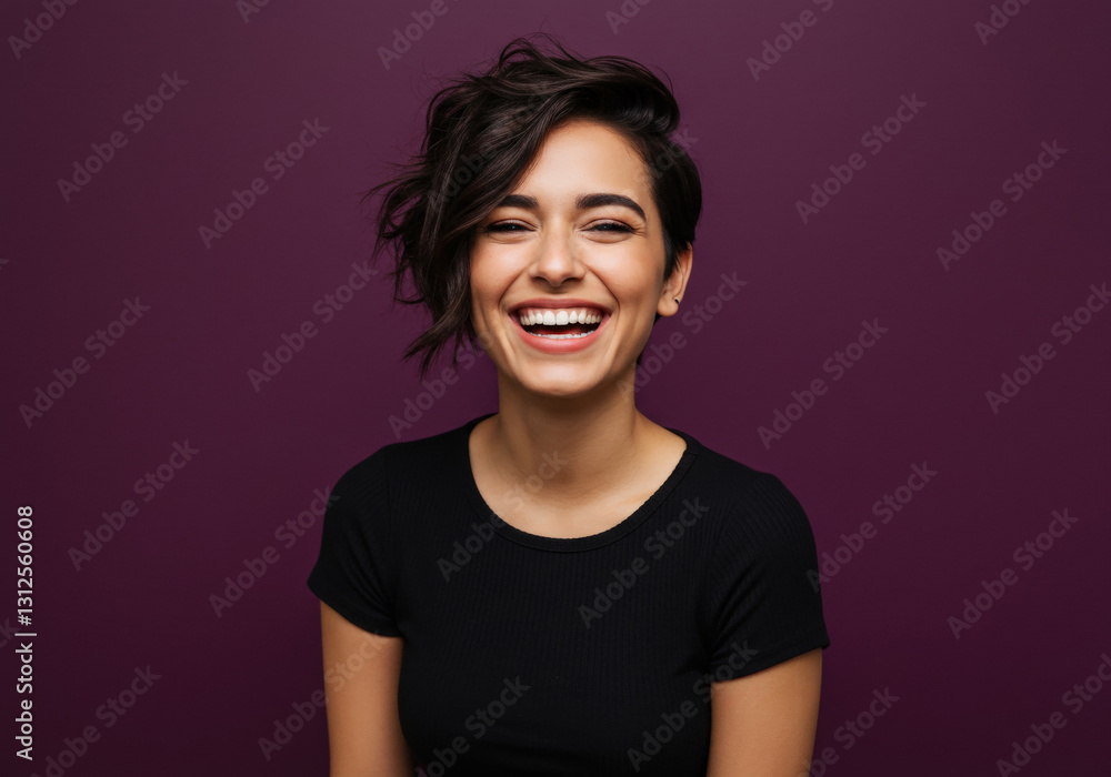 Young woman with short haircut happy on purple background Young woman with short haircut happy on purple background