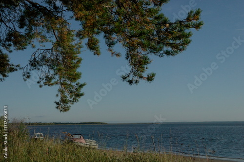 fishing boats on the sandy shore of the White Sea