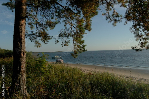fishing boats on the sandy shore of the White Sea