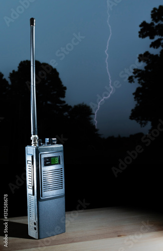 Obraz na płótnie Lightning bolt hitting the trees behind a CB radio walkie-talkie w salonie
