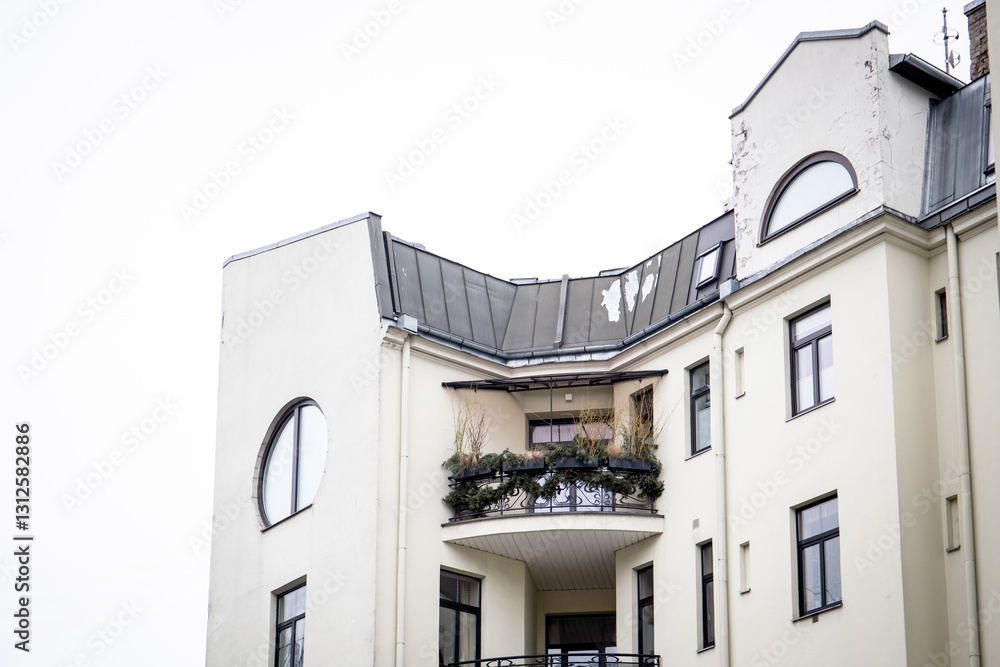 Architectural Detail of Building with Curved Roof and Balcony Architectural Detail of Building with Curved Roof and Balcony
