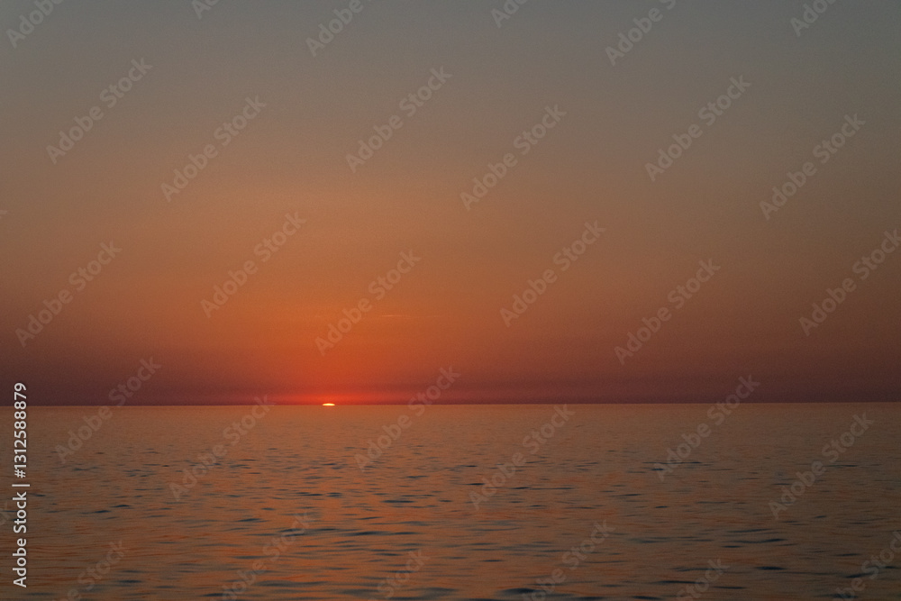 sunset on sea sky background, sunset sky, clouds over sea in evening with orange, yellow sunlight in golden hour.copy space sunset on sea sky background, sunset sky, clouds over sea in evening with orange, yellow sunlight in golden hour.copy space