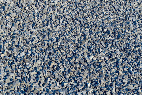 Texture of crushed stone or gravel flat lay 