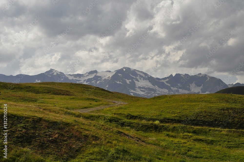 Fototapeta premium landscape with mountains and clouds, tour of the Ecrins and Oisans Massif, hiking, trek, GR54, Alps, France