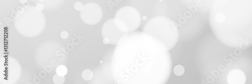White bokeh background, light circles, soft blur, grey backdrop, website design