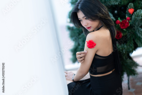 Obraz na płótnie valentine's day, Portrait beautiful asian people woman fashion model in summer Black dress and coffee in cup holding bouquet of red roses in the living room inside or cafe w salonie