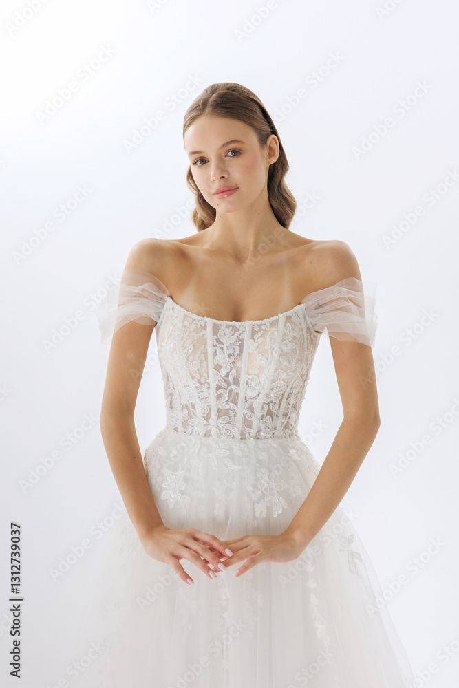 Bridal portrait of a woman wearing an elegant white wedding gown in a soft, bright studio setting Bridal portrait of a woman wearing an elegant white wedding gown in a soft, bright studio setting