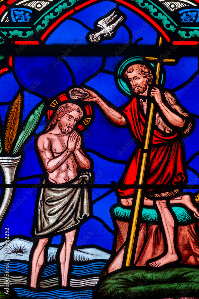 Fototapeta premium 2025-01-26, Église Saint Marc - Orléans, FRANCE. Stained glass (19th century) of Baptism of Jesus by John the Baptist in the Jordan river. .