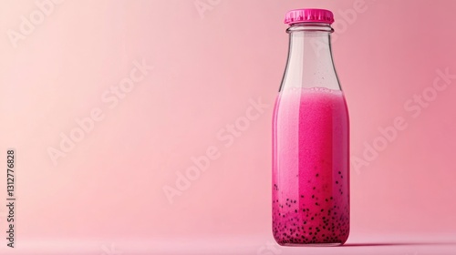 Wallpaper Mural Refreshing Pink Beverage in Clear Glass Bottle with Black Seeds on Soft Pink Background Torontodigital.ca