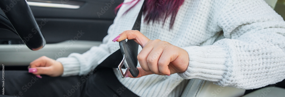 Fototapeta premium Empowering Safety: Female Drivers and the Importance of Seat Belt Use in Traffic Rules