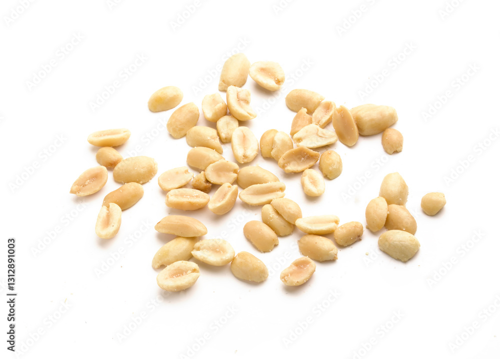 scattered roasted peanuts on white background scattered roasted peanuts on white background