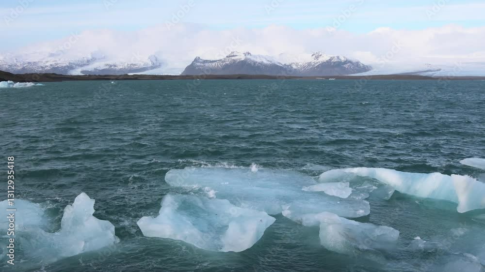 Icebergs floating on jokulsarlon glacier lagoon in iceland Icebergs floating on jokulsarlon glacier lagoon in iceland