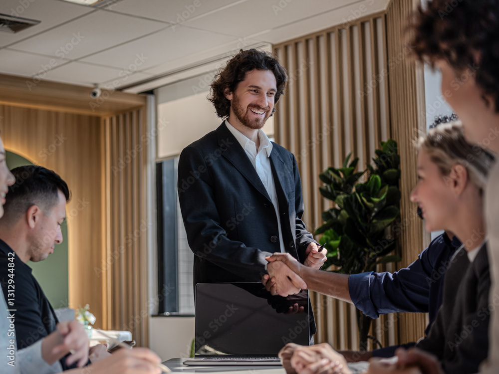 Successful Business Meeting with Handshake Between Confident Partners