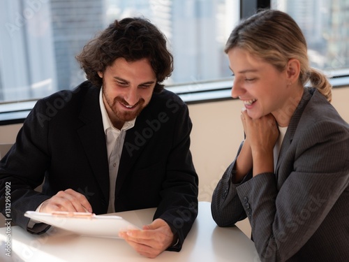 Obraz na płótnie Businessmen collaborating on paperwork in modern office w salonie