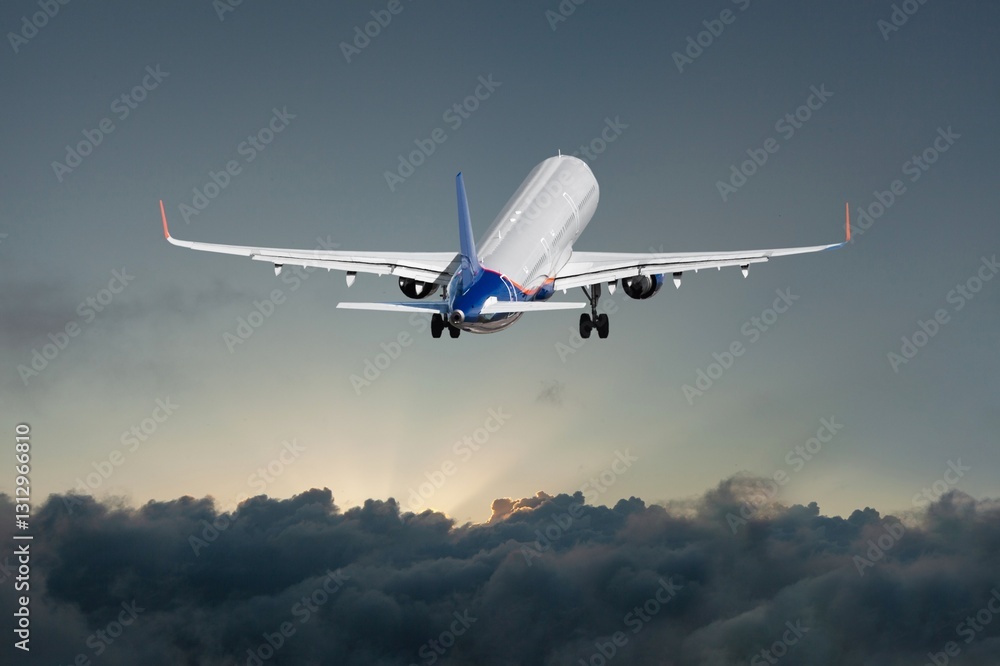 Obraz premium A white private plane in flight against blue sky