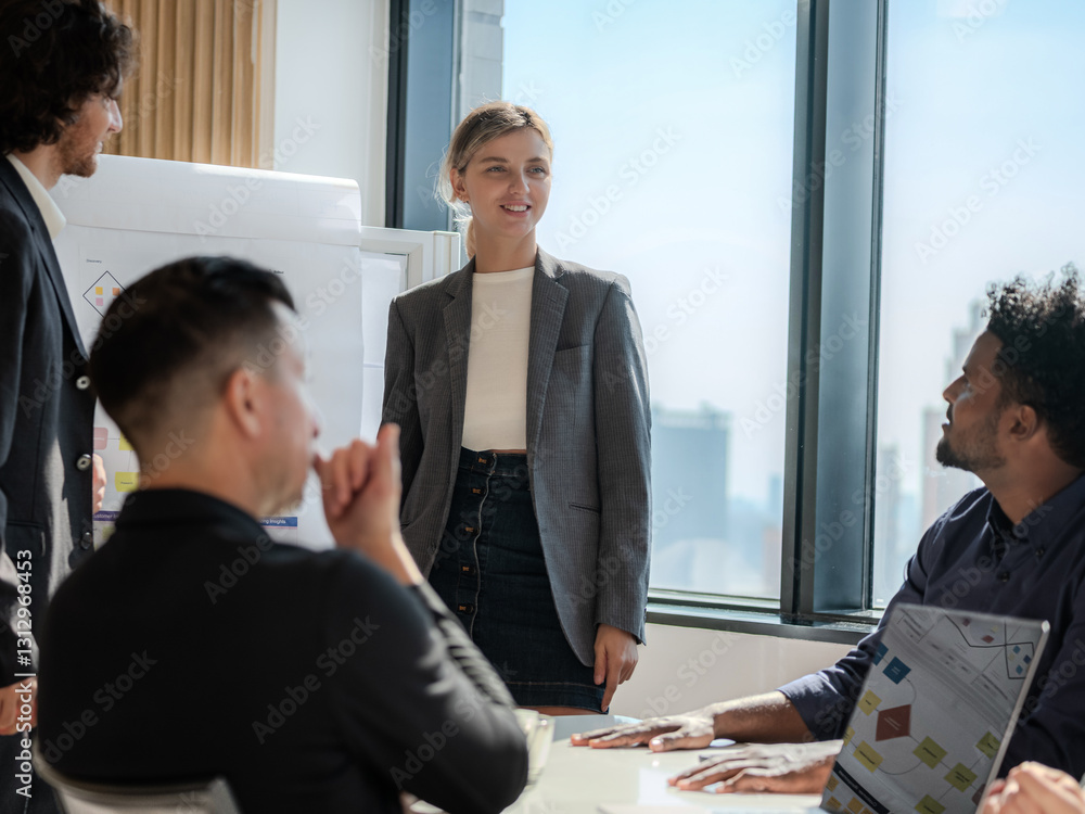 Diverse Business Team Collaborating in Modern Office Meeting