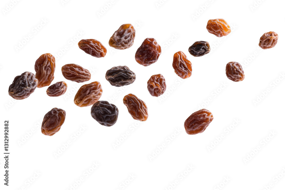 Bunch of raisins are scattered across a white background, isolated Bunch of raisins are scattered across a white background, isolated