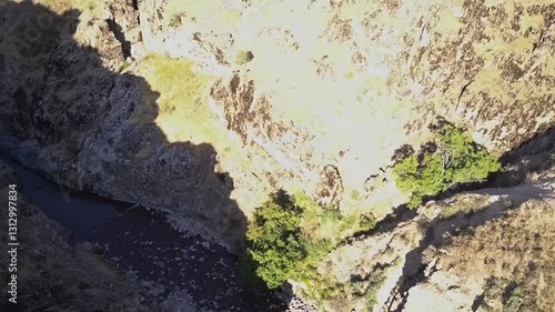 Wallpaper Mural The drone flies over a mountain canyon with a river. A sunny summer day. Torontodigital.ca