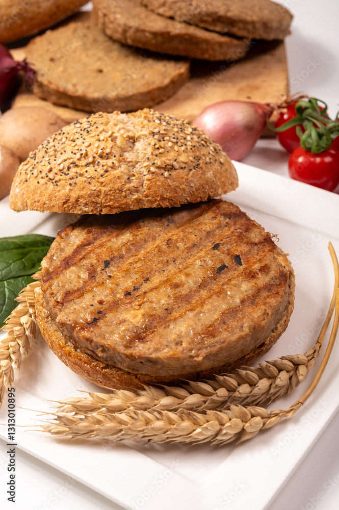 Make burger buns with vegan or vegetarian patties or burgers made from grains, vital wheat gluten food, grilled healthy food Make burger buns with vegan or vegetarian patties or burgers made from grains, vital wheat gluten food, grilled healthy food