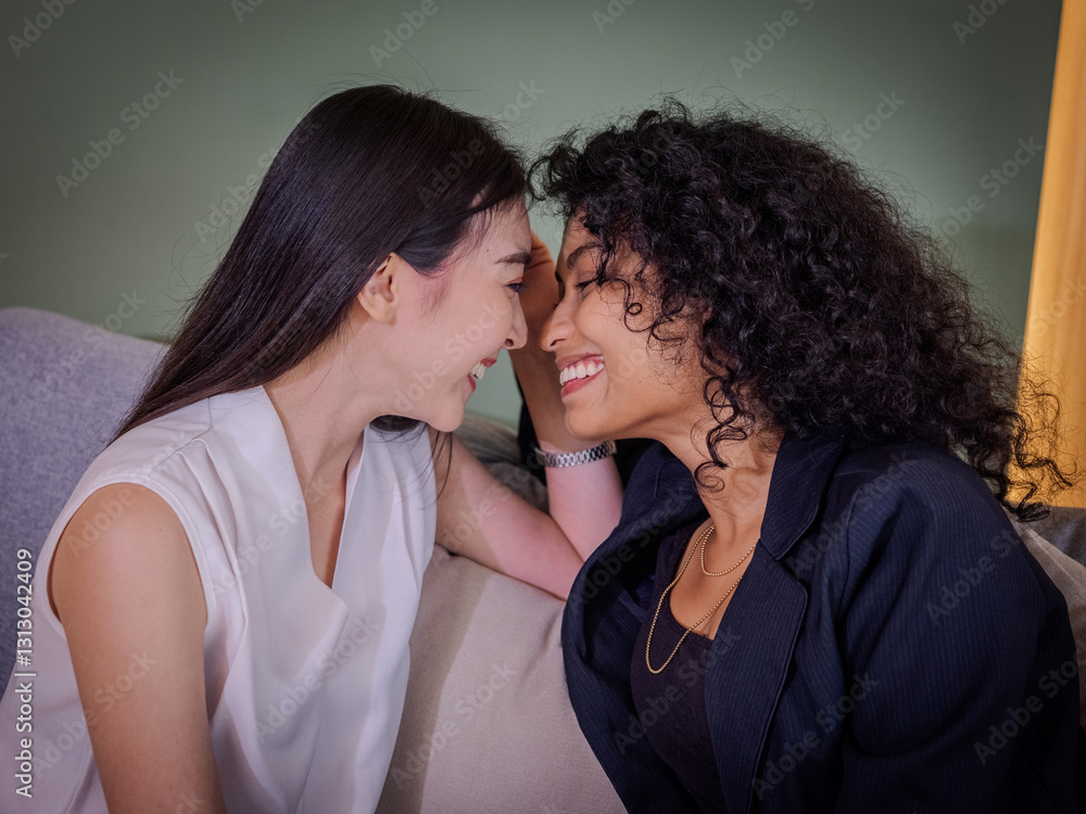 Intimate affectionate moment between two loving women in a warm embrace Intimate affectionate moment between two loving women in a warm embrace