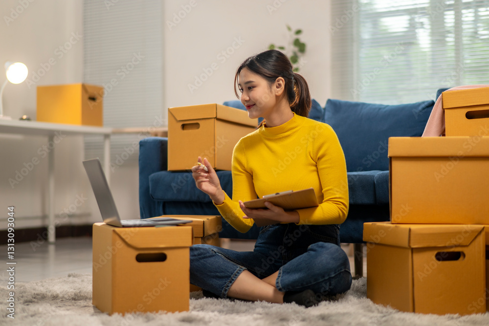 A woman sits on the floor in front of a pile of cardboard boxes A woman sits on the floor in front of a pile of cardboard boxes