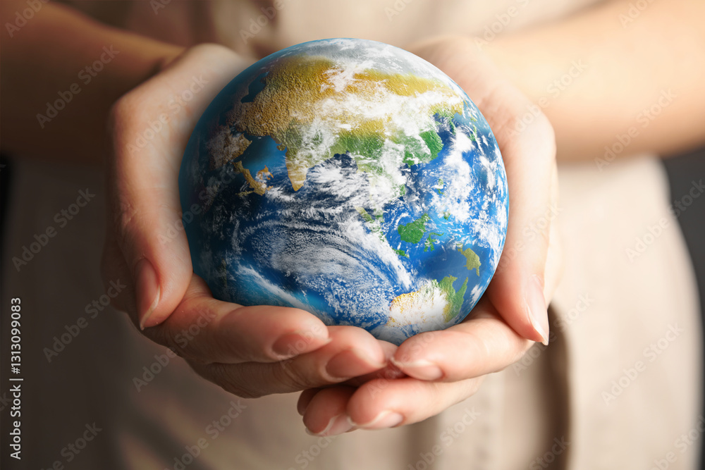Planet in our hands. Woman holding Earth model, closeup Planet in our hands. Woman holding Earth model, closeup