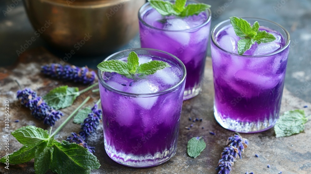 Refreshing Lavender Cocktails with Mint Garnish and Ice Cubes Refreshing Lavender Cocktails with Mint Garnish and Ice Cubes