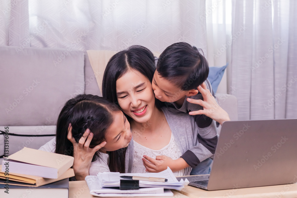 Happy single mom with children playing together bonding relationship at home, Asian freelancer woman working at home using modern technology laptop, kids sibling run to hug mother from behind and kiss Happy single mom with children playing together bonding relationship at home, Asian freelancer woman working at home using modern technology laptop, kids sibling run to hug mother from behind and kiss