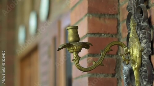 old wall lamp in front of the house