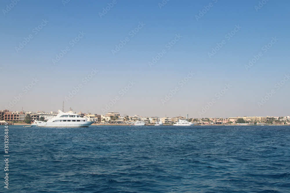 Red sea seascape with yachts on a sunny day in Hurghada, Egypt Red sea seascape with yachts on a sunny day in Hurghada, Egypt