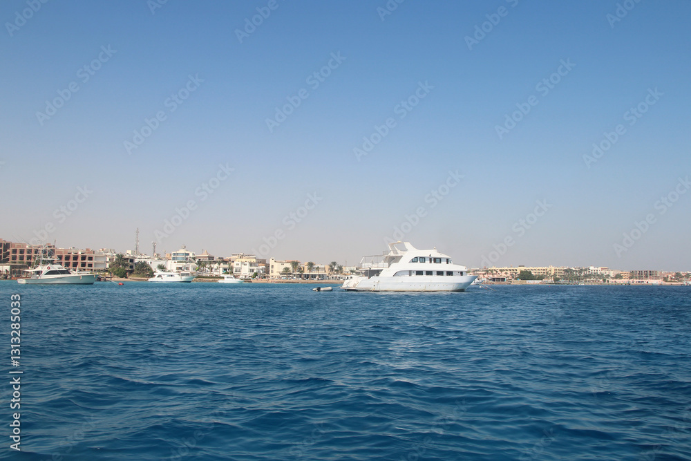 Red sea seascape with yachts on a sunny day in Hurghada, Egypt Red sea seascape with yachts on a sunny day in Hurghada, Egypt