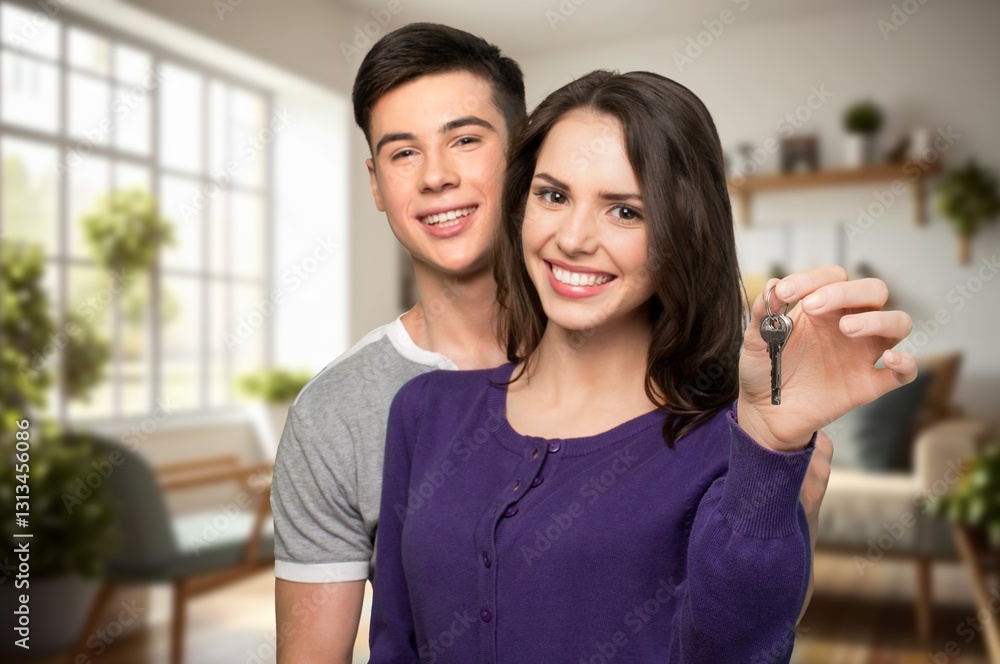 Fototapeta premium Young happy married couple, new house concept