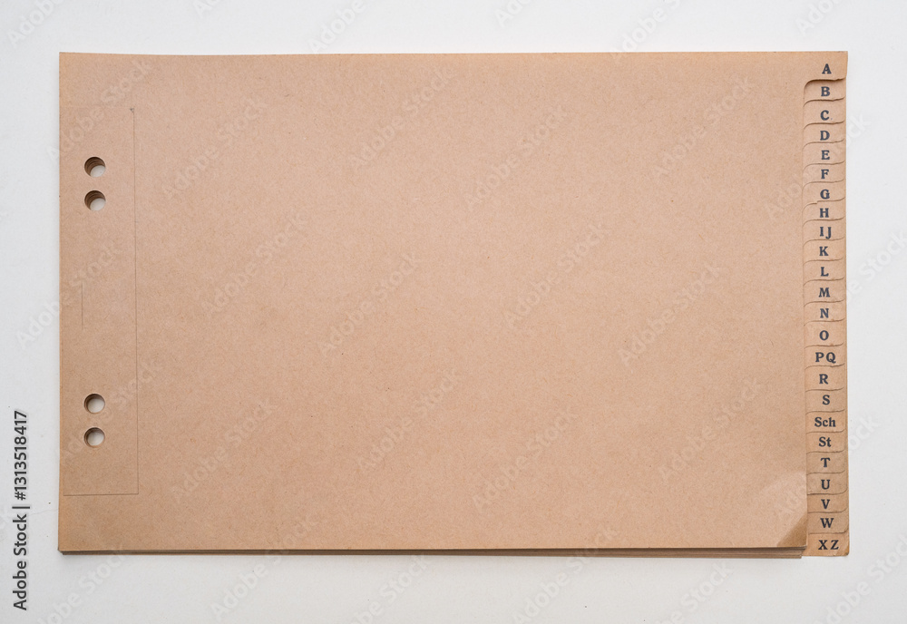 Naklejka premium ancien bloc notes vierge avec alphabet