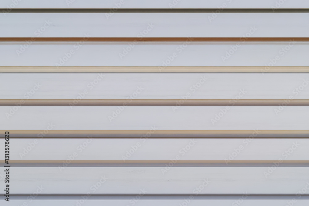 Fototapeta premium Horizontal wooden slats line the wall in a minimalist setting creating a simple yet elegant backdrop