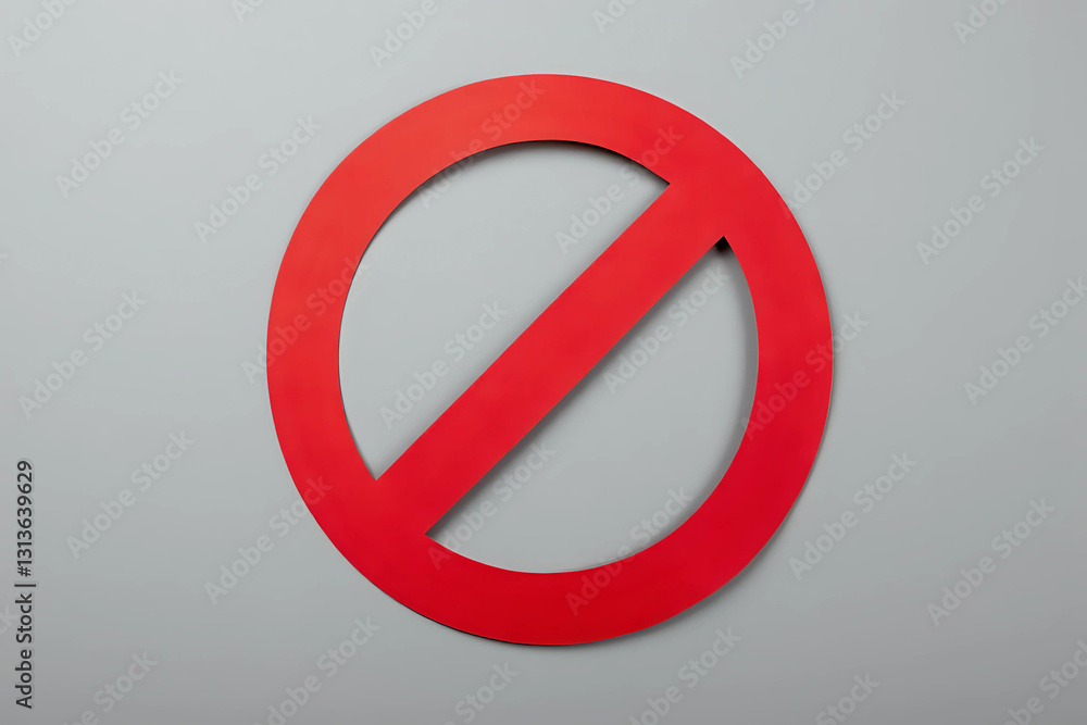 Red prohibition sign cut out of paper on a gray background Red prohibition sign cut out of paper on a gray background