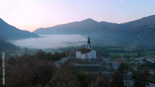 Wallpaper Mural drone approaching Italian Charnel House in Kobarid, early spring morning, dark and misty Torontodigital.ca