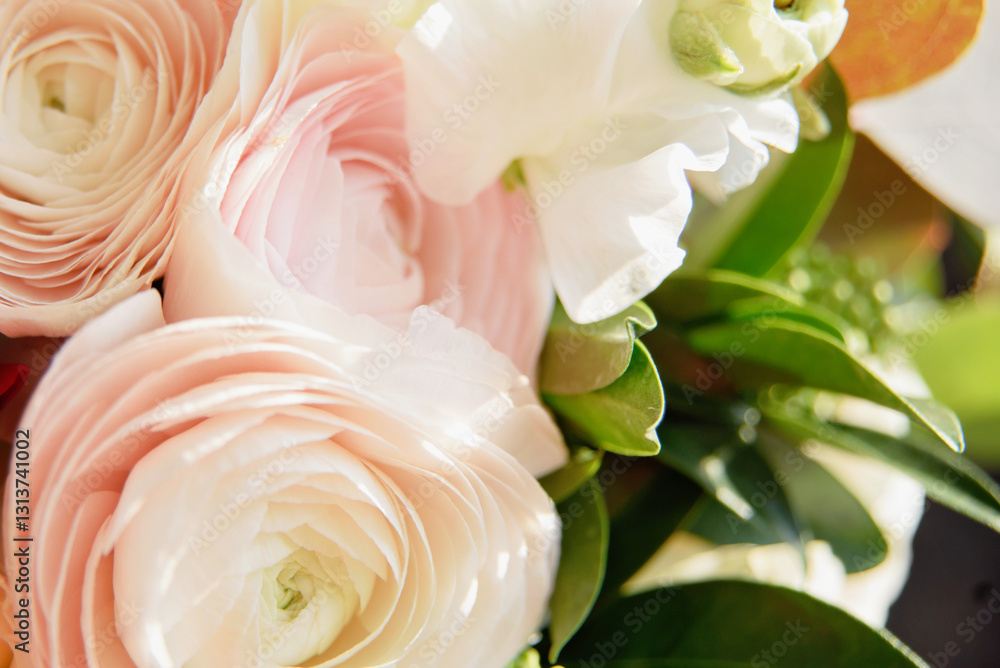 Fototapeta premium Beautiful holiday card. Mother Day greeting card. Delicate bouquet of white ranunculus and pastel tulips with soft green leaves, creating a romantic and elegant floral scene