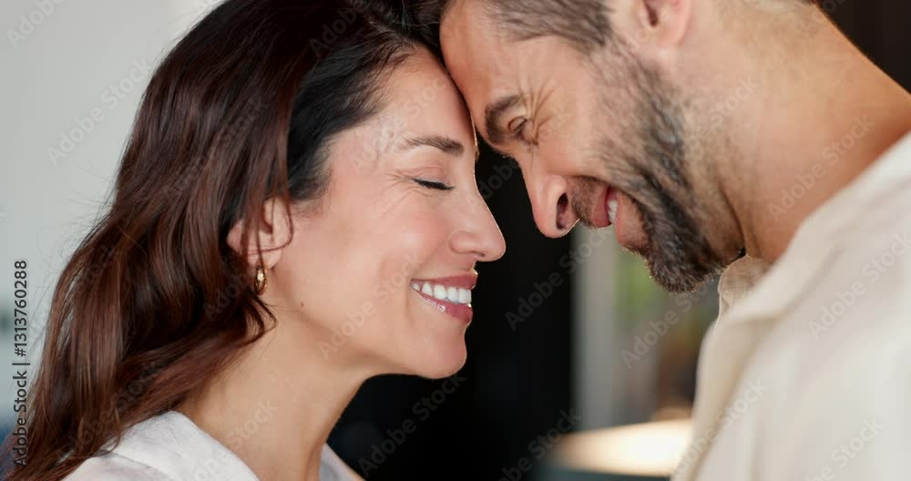 Forehead, house and couple with romance, smile and bonding together in living room. People, apartment and man with woman, relationship and marriage with trust, humor and affection with love and funny Forehead, house and couple with romance, smile and bonding together in living room. People, apartment and man with woman, relationship and marriage with trust, humor and affection with love and funny